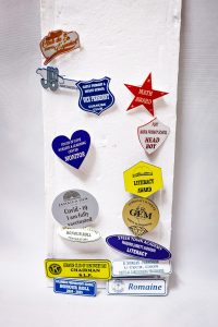 Custom badges by The Achiever's Sports & Trophies Ltd., Ocho Rios, Jamaica
