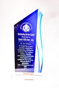 Glass and crystal award by The Achiever's Sports & Trophies Ltd., Ocho Rios, Jamaica